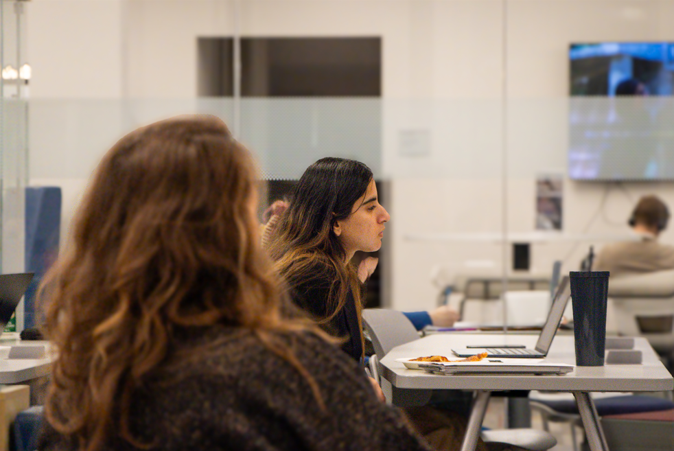 a student listening to a presentation