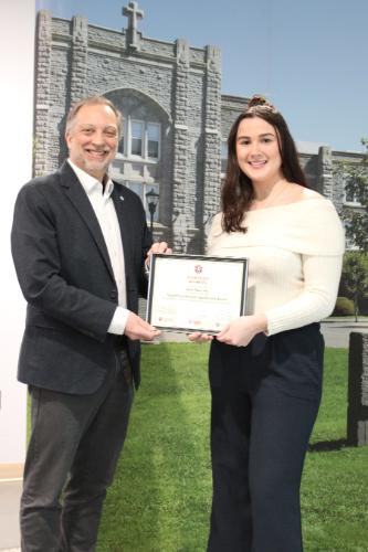 Kara accepting the SLRA award
